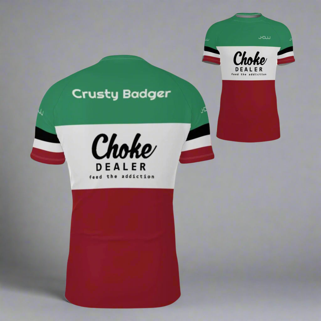Green, red, and white BJJ rash guard with 'Crusty Badger' and 'Choke Dealer' text on a white background.