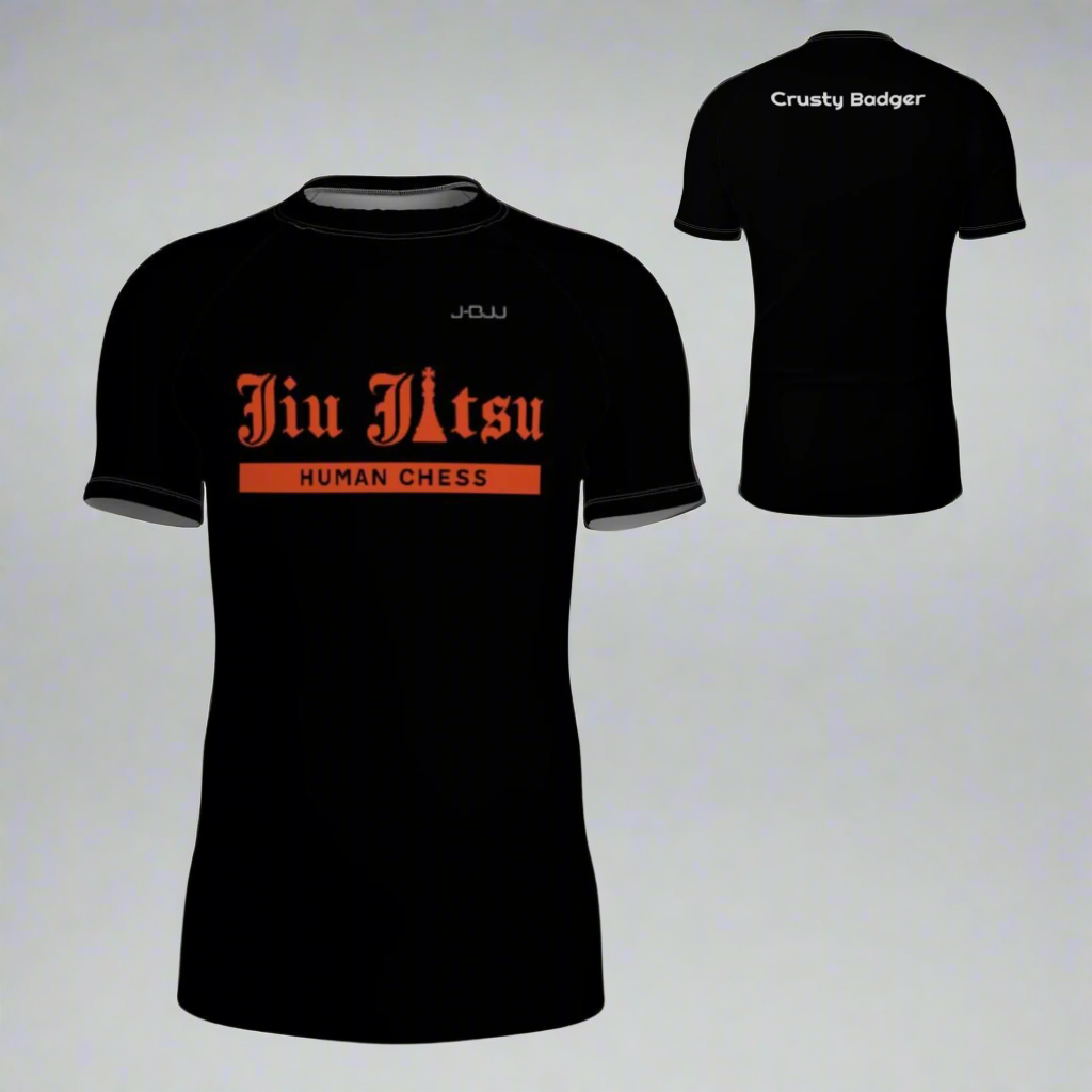 Black jiu jitsu rash guard with orange text on a white background