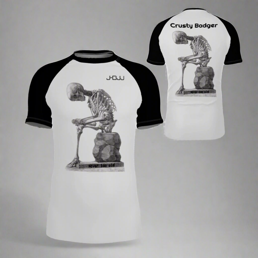 Two bjj rash guards with skeleton designs and text on a white background
