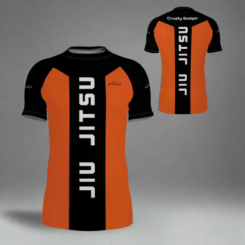Black and orange 'JIU JITSU' branded rash guard on a white background