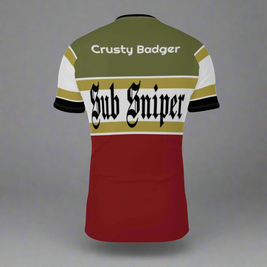 Colorful BJJ rash guard with 'Crusty Badger' and 'Sub Sniper' text on a white background