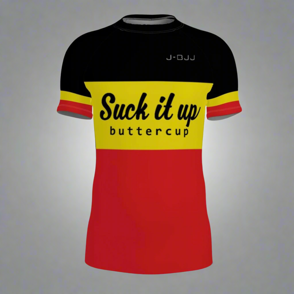 Black, yellow, and red jiu jitsu rash guard with text on a white background