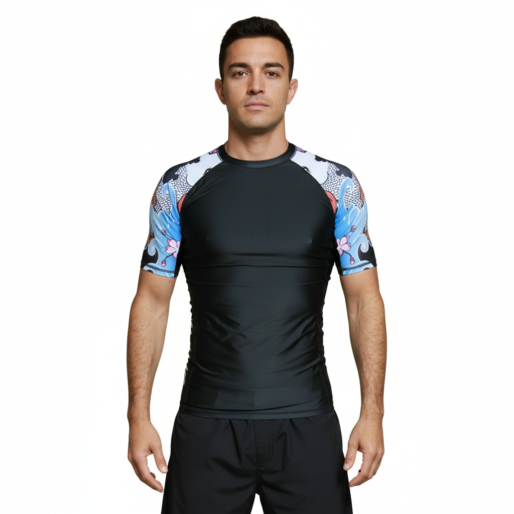 Black BJJ rash Guard with flowery Sleeves worn by a slim man against a white background.