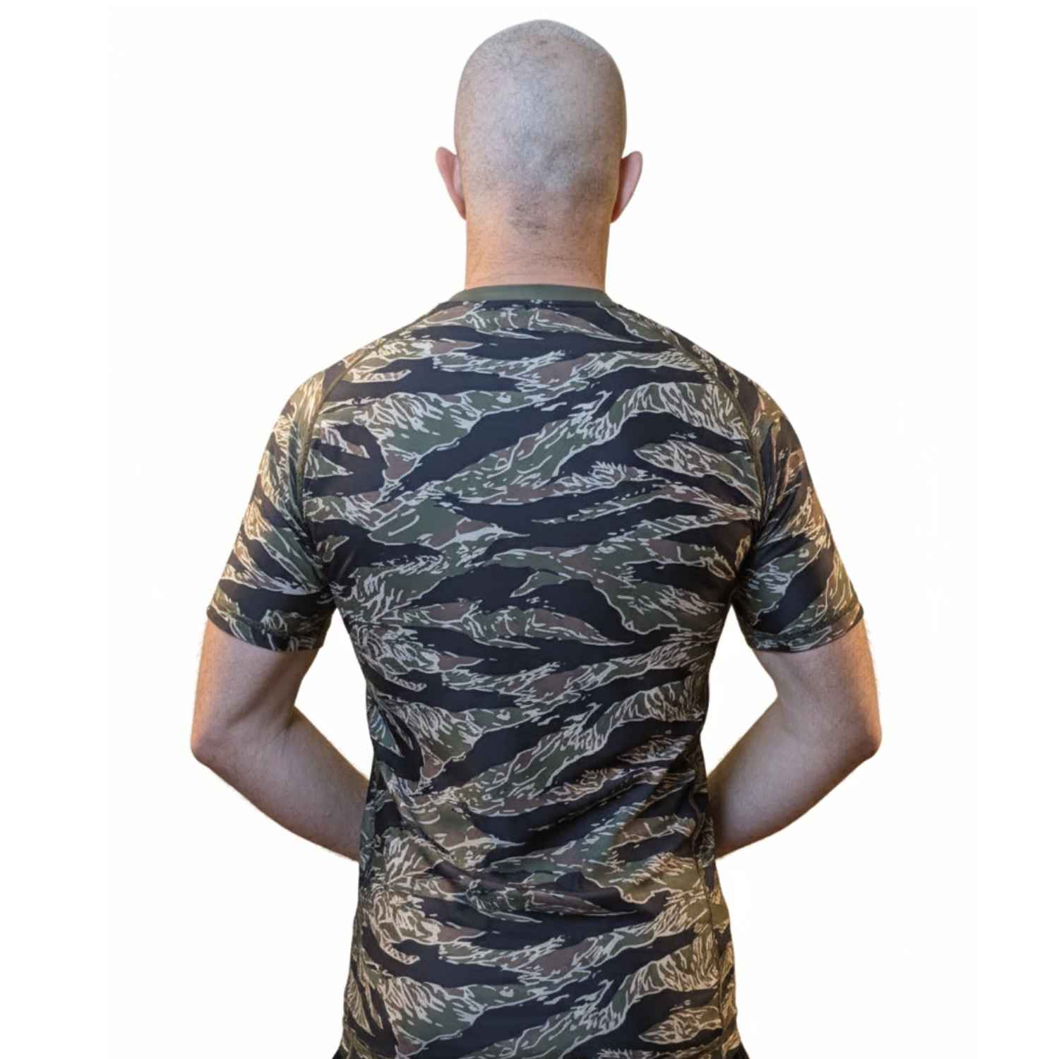 Person wearing a camouflage BJJ rash guard rear shot on a white background