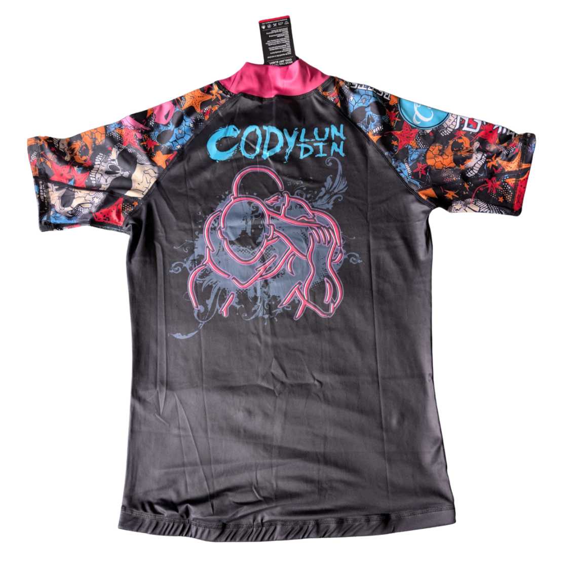 Black BJJ rash guard with colorful sleeves and 'Cody Lun' branding. White background