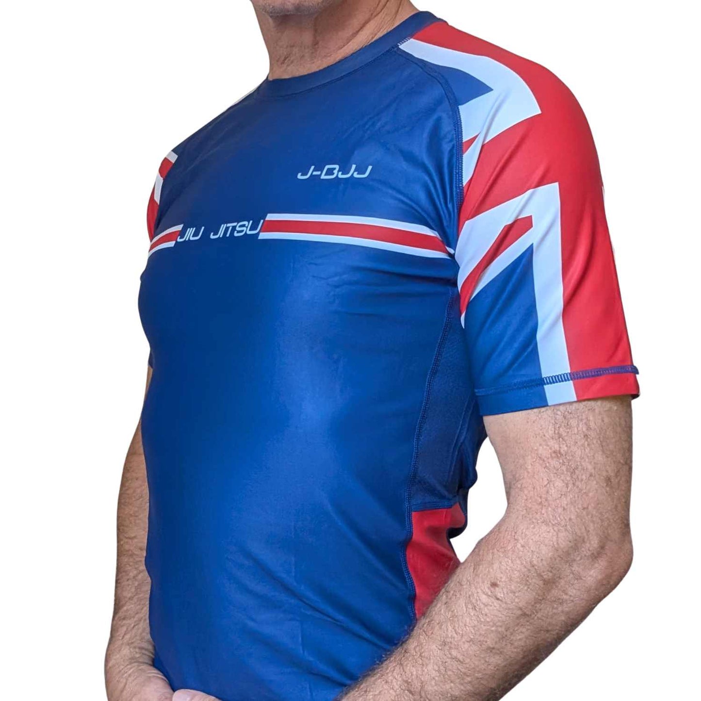 Blue and red Jiu Jitsu rash gaurd shirt with visible branding on a white background