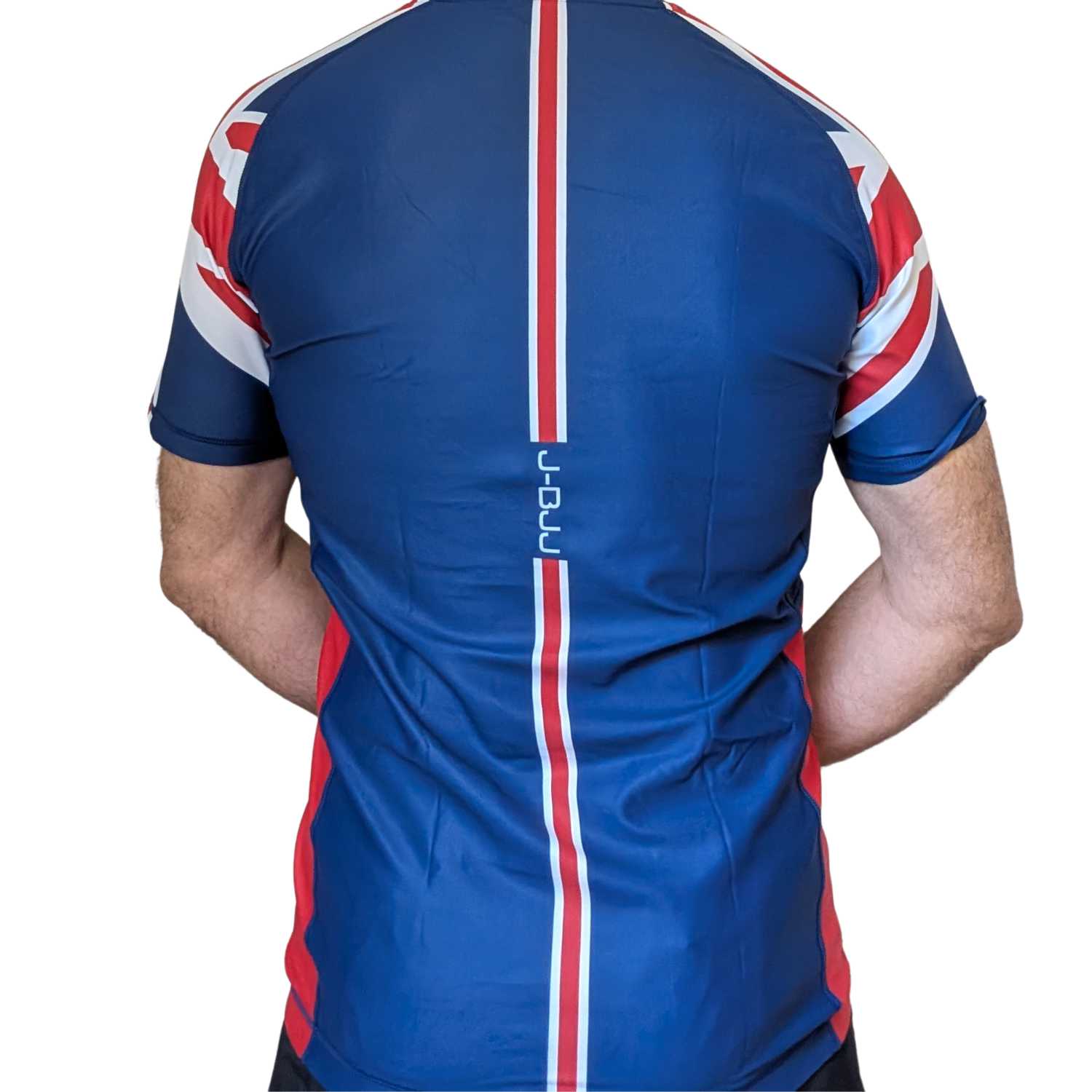 Blue BJJ rash guard with red and white accents on a white background