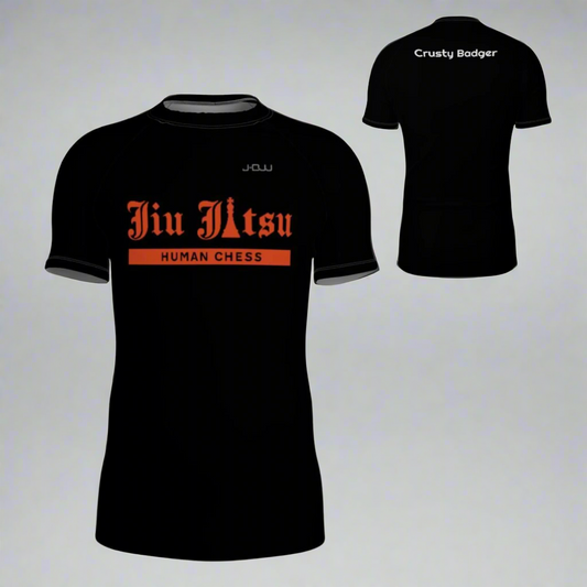 Black jiu jitsu rash guard with orange text on a white background