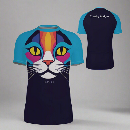 Colorful cat-themed jiu jitsu rash guard with light blue sleeves and dark blue body, featuring 'Crusty Badger' personalization on the back.