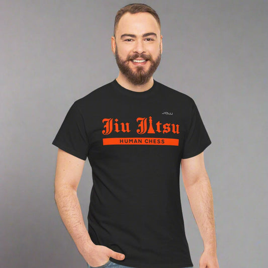 Man wearing a black Jiu Jitsu t-shirt with orange text on a white background
