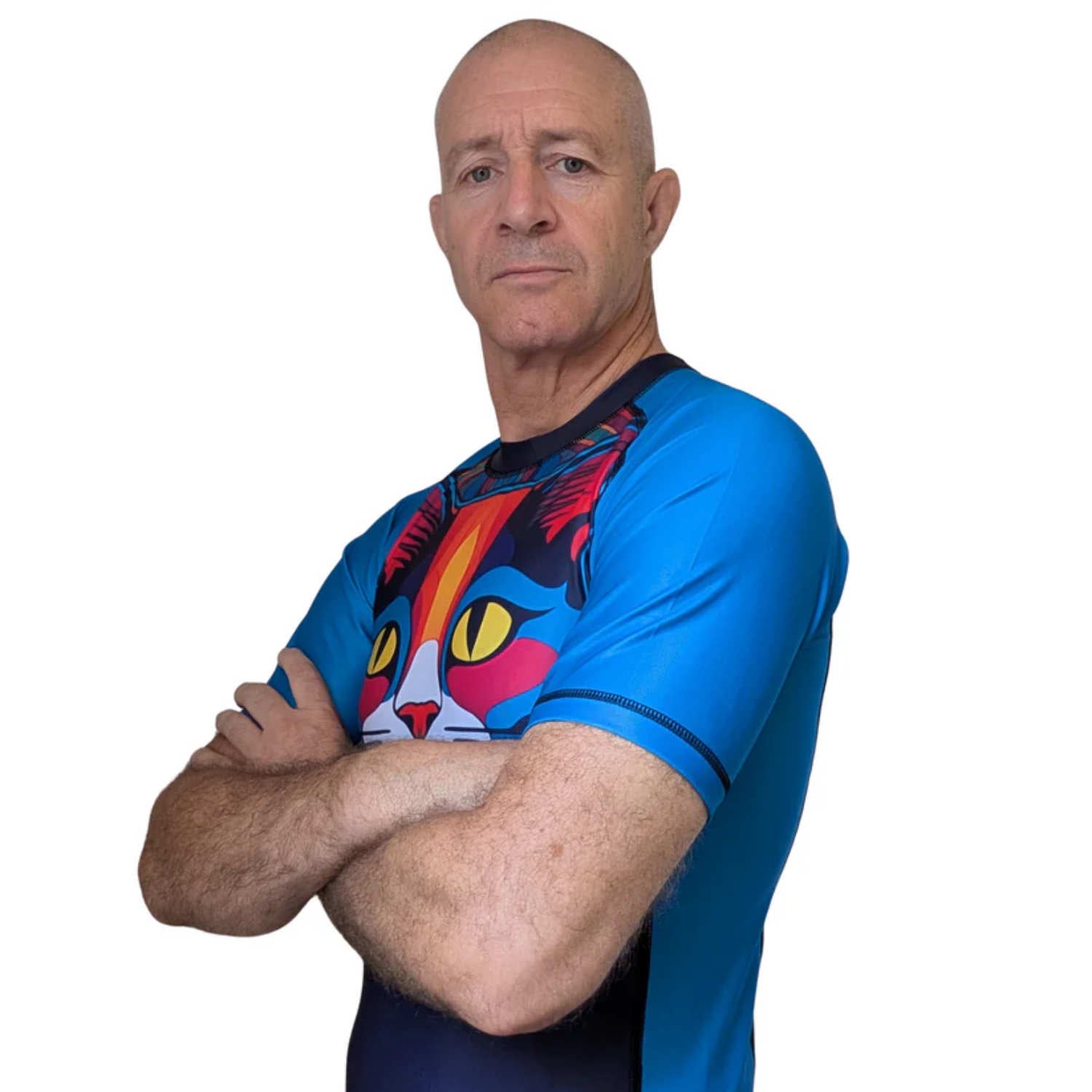Man wearing a blue BJJ rash guard with a colorful cat design on a white background