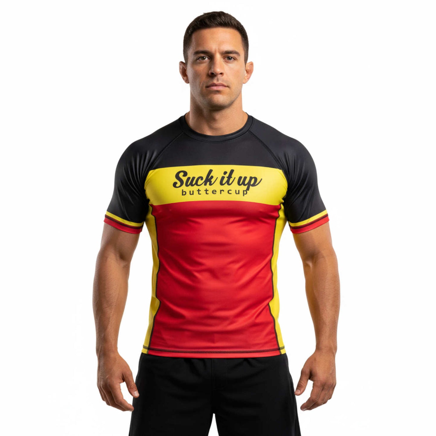 Man wearing a black, red, and yellow BJJ rash guard with text on a white background